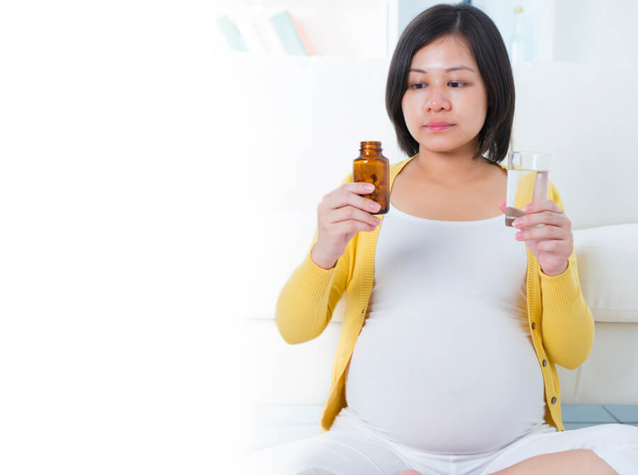 La toma de ácido fólico antes del embarazo reduce el riesgo a