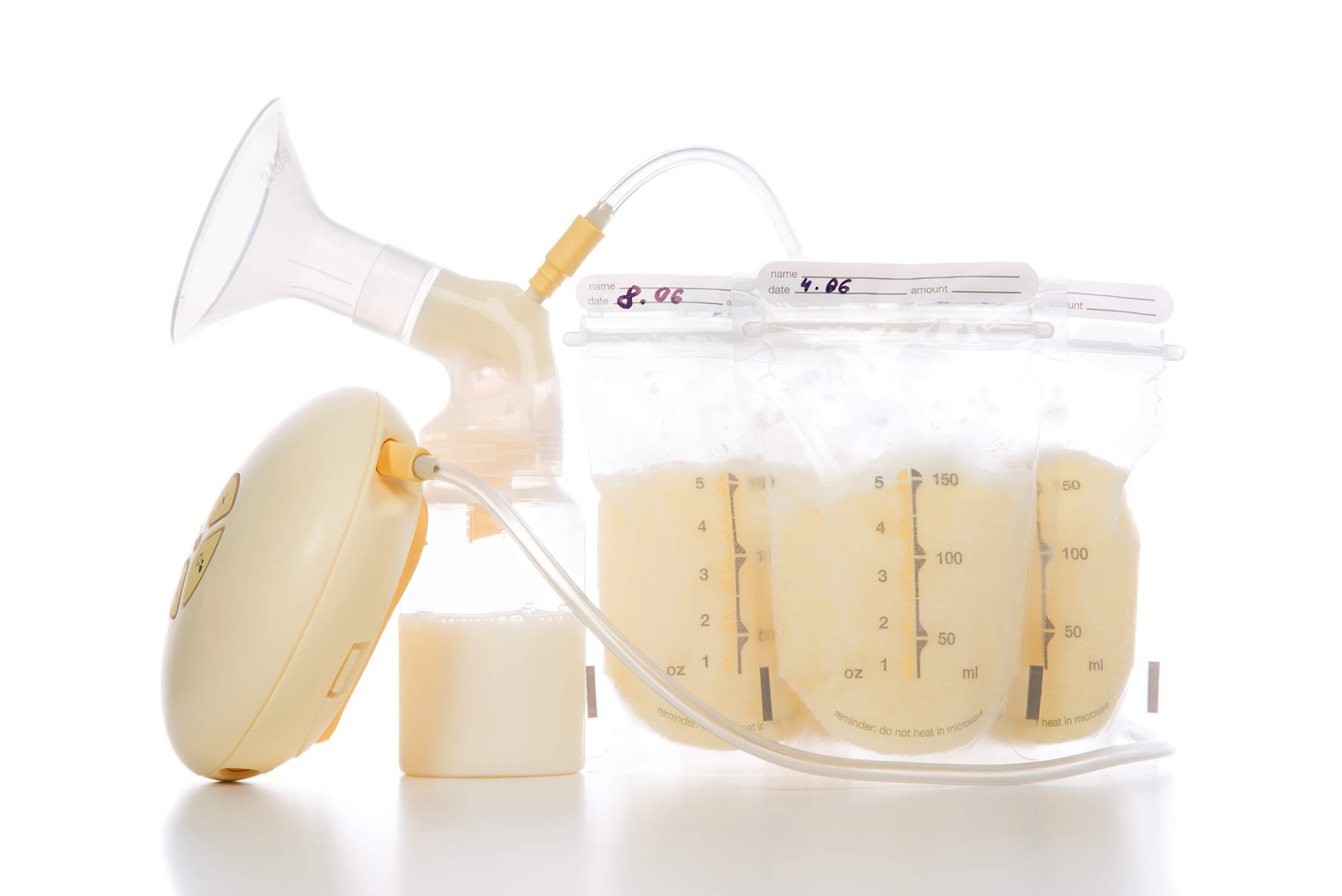Young Mother Pumped Breastmilk. Pump Works On Batteries